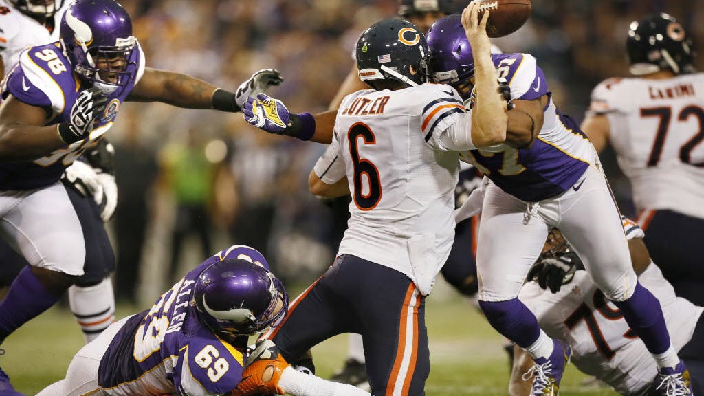 The Vikings defeated the Chicago Bears 21-14 and kept their playoff hopes alive.