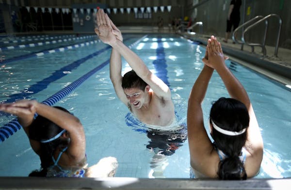 Latino kids try swimming lessons for the first time