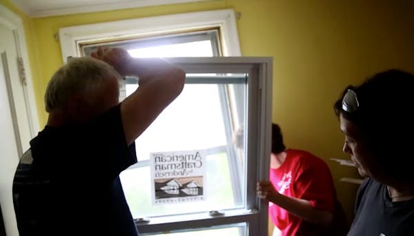 Volunteers work to rebuild homes