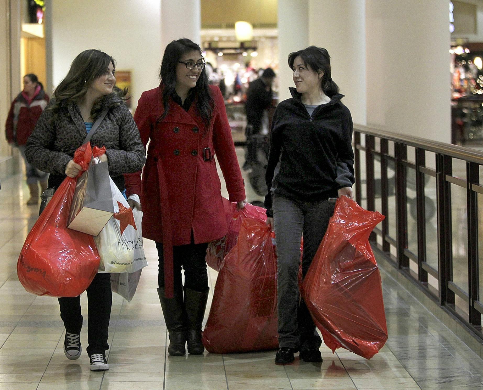 Shoppers around the metro braved cold winds and snow Thursday night to get a jump on their Black Friday shopping.
