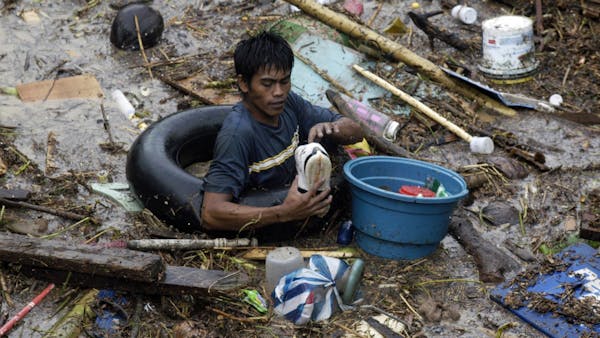 Flash floods ravage cities in southern Philippines