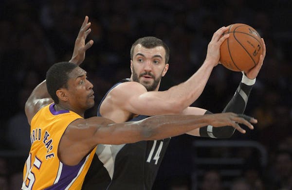 Rebounding Lakers too much for Wolves