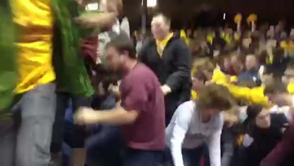 Gopher fans storm the court