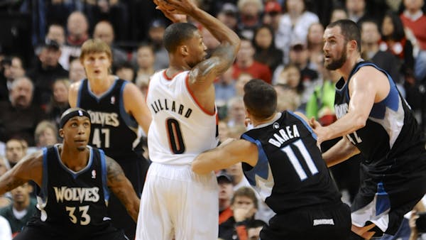 Wolves lose fourth straight, 103-95 at Portland