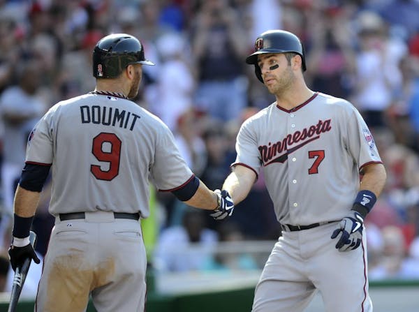 Mauer, Doumit provide offense-starved Twins a lift in 11 innings