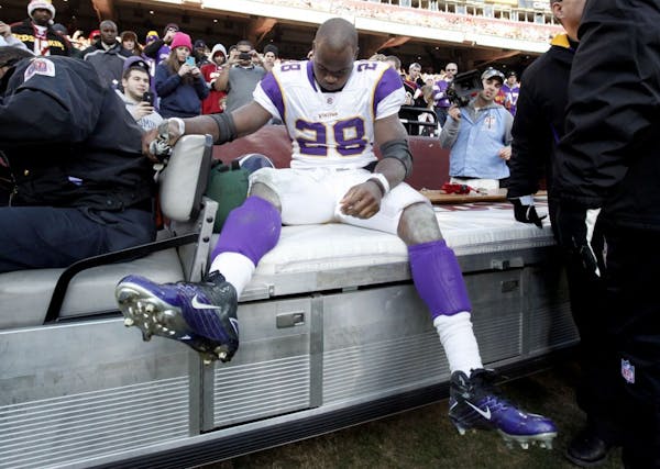 Peterson's torn ACL overshadows Vikings' victory over Redskins