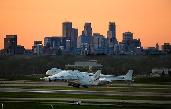 Twin Cities plane enthusiasts gather to watch largest airplane take off