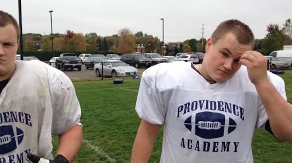 Providence Academy football players Trent and Trey Wiebusch