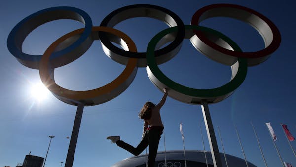 Athletes in Sochi share spotlight with security measures