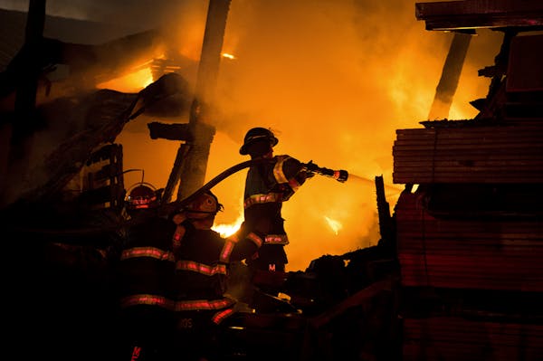 Minneapolis firefighters battle blaze at a Northeast lumberyard