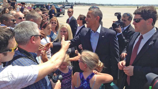 Top headlines: Obama in Minn., Fox anchor struggles with police, US advances in soccer