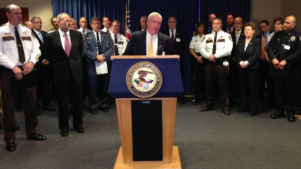 More than 65 charged in Minn. heroin crackdown