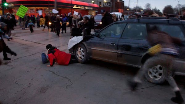 County won't charge man who drove into protesters in Mpls.