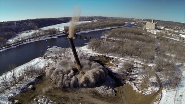 Aerial video shows smokestack implosion