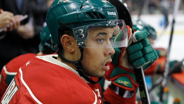 Yeo splits up Parise, Koivu in their first exhibiton game