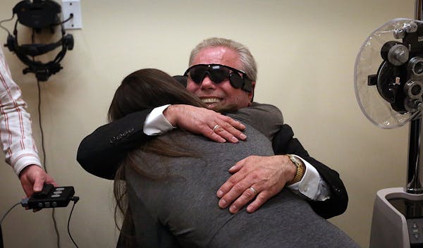 With bionic eye, blind man sees wife for first time