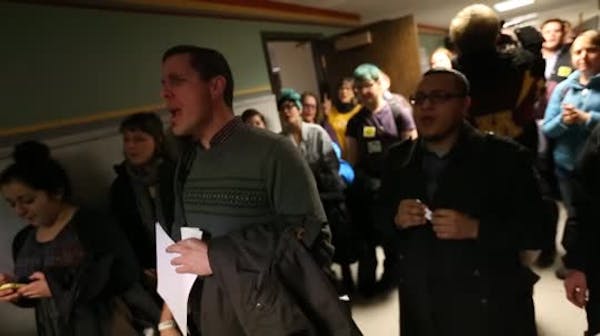 Protesters at Mpls. budget meeting