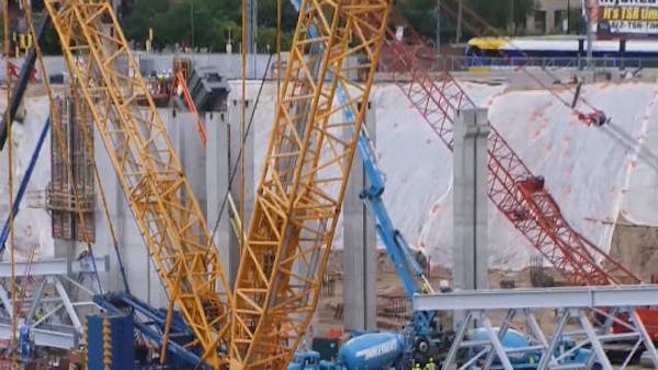 StribCast: Giant crane ready to build Vikings stadium; U president gets raise
