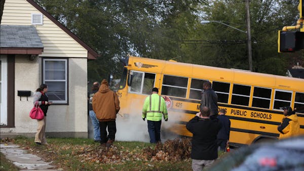Bus collides with SUV, then house