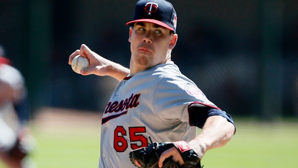 May leads the way in Twins win
