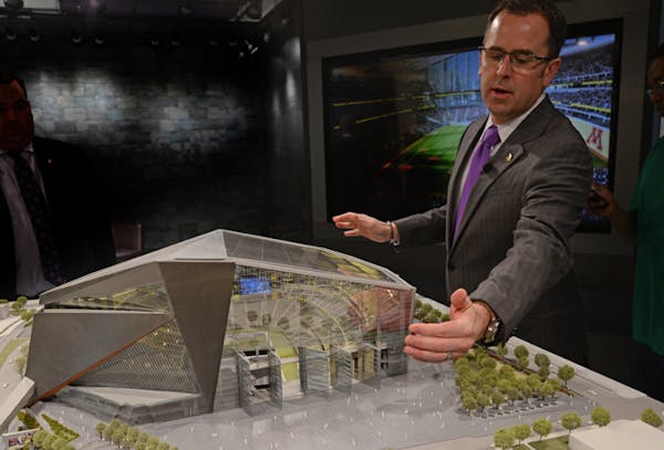 Vikings open glitzy preview center to sell new stadium to fans