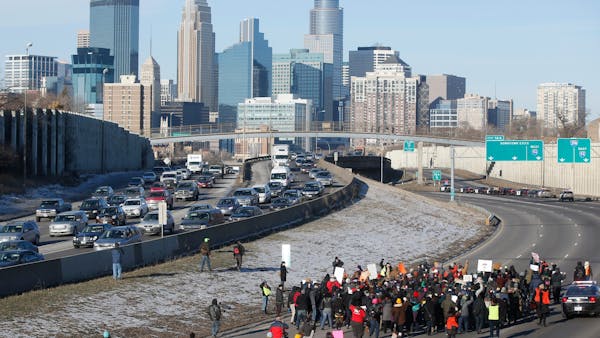Protesters block I-35W in Minneapolis, get heard at City Hall