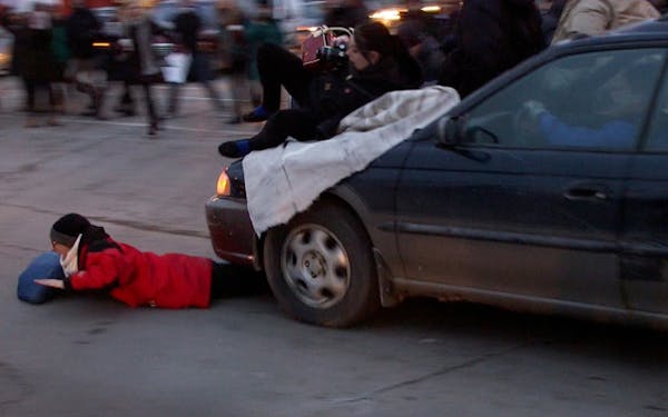 Plea in works for man who drove through protesters in Mpls. street