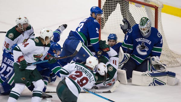Wild's late rally falls a goal short in costly loss at Vancouver