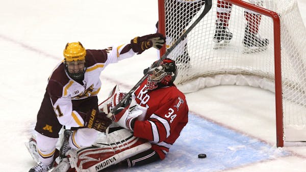 Lucia returns, Gophers respond with win
