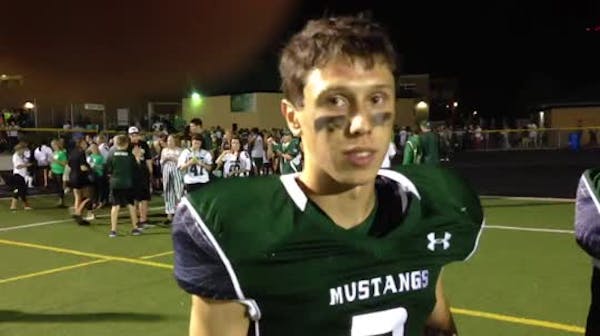 Mounds View players talk after 2OT victory