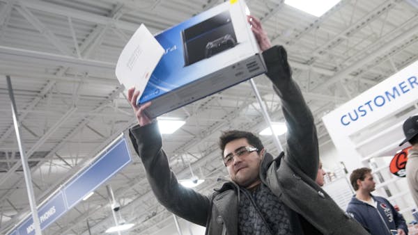 PlayStation 4 gamers line up overnight to buy