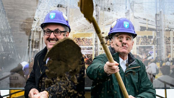 Fans and officials break ground for the new Vikings stadium