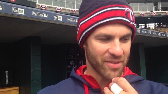 Twins first baseman Joe Mauer says Phil Hughes deserves the honor of starting Opening Day game on Monday.
