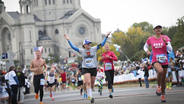 Relive the finish line of the Twin Cities Marathon