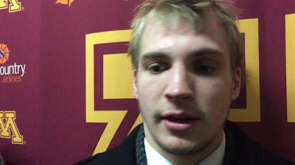 Gophers sweep Michigan, move into first-place tie
