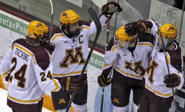 Warning leads way on big night for Gophers top forwards