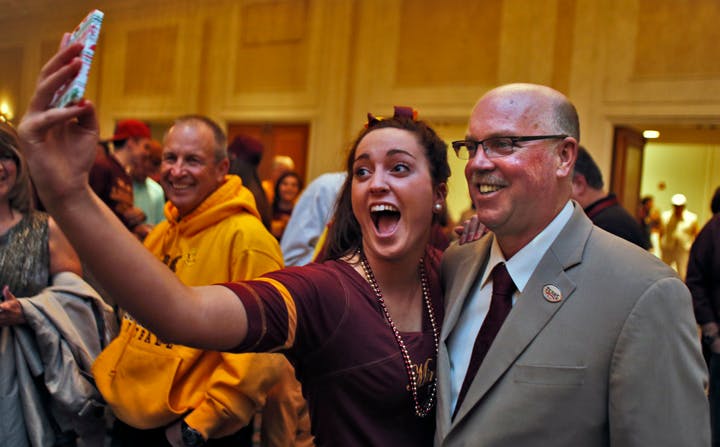 Pep rally, luncheon and news conference kept Gophers fans and players busy in Texas.