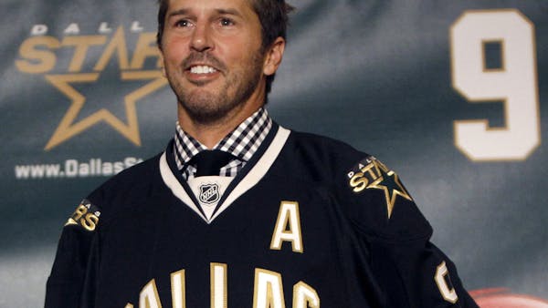 Wild minute: Mike Modano's No. 9 rises to the rafters