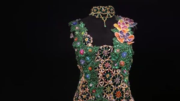 Edina woman claims world's largest beaded wedding dress