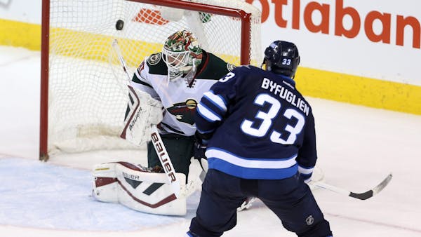 Wild gains ground, but not on Winnipeg, after OT loss to Jets