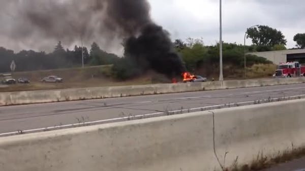 Burning car halts traffic on I-394 at Hwy. 100