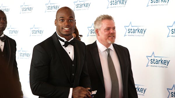 Vikings players, actors and musicians walk the red carpet in St. Paul