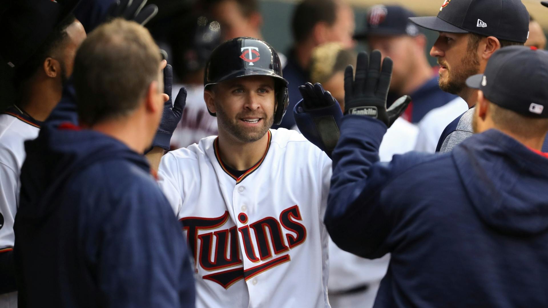 Twins second baseman Brian Dozier liked his teammates' glove work on Opening Day