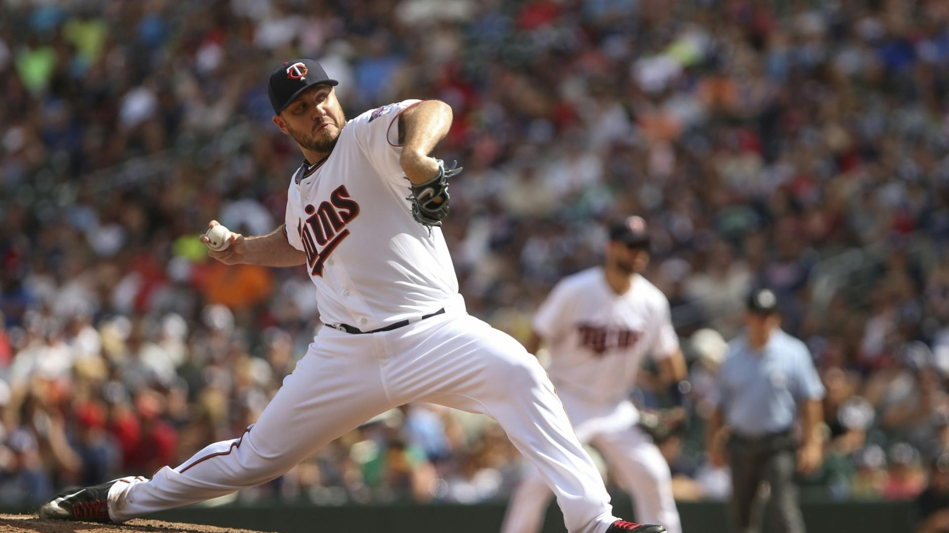The Twins reliever walked the first two batters he faced on Sunday afternoon in his Minnesota debut.