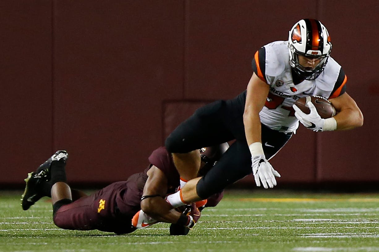 Gophers linebacker Jack Lynn and safety Damarius Travis evaluate the defense after Thursday's win vs. Oregon State