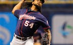Home runs bail out Santana as Twins win fifth straight road game