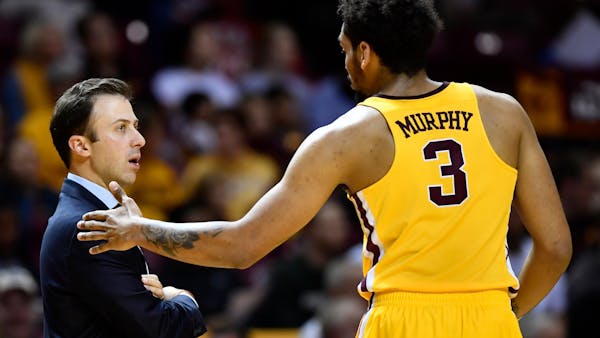 Richard Pitino and Jordan Murphy after Gophers exhibition win