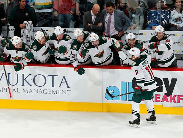 Four-goal explosion gives Wild an opening-night win