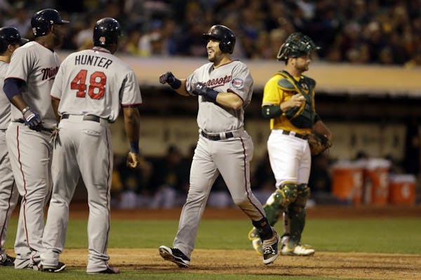Plouffe hits huge grand slam in win over A's
