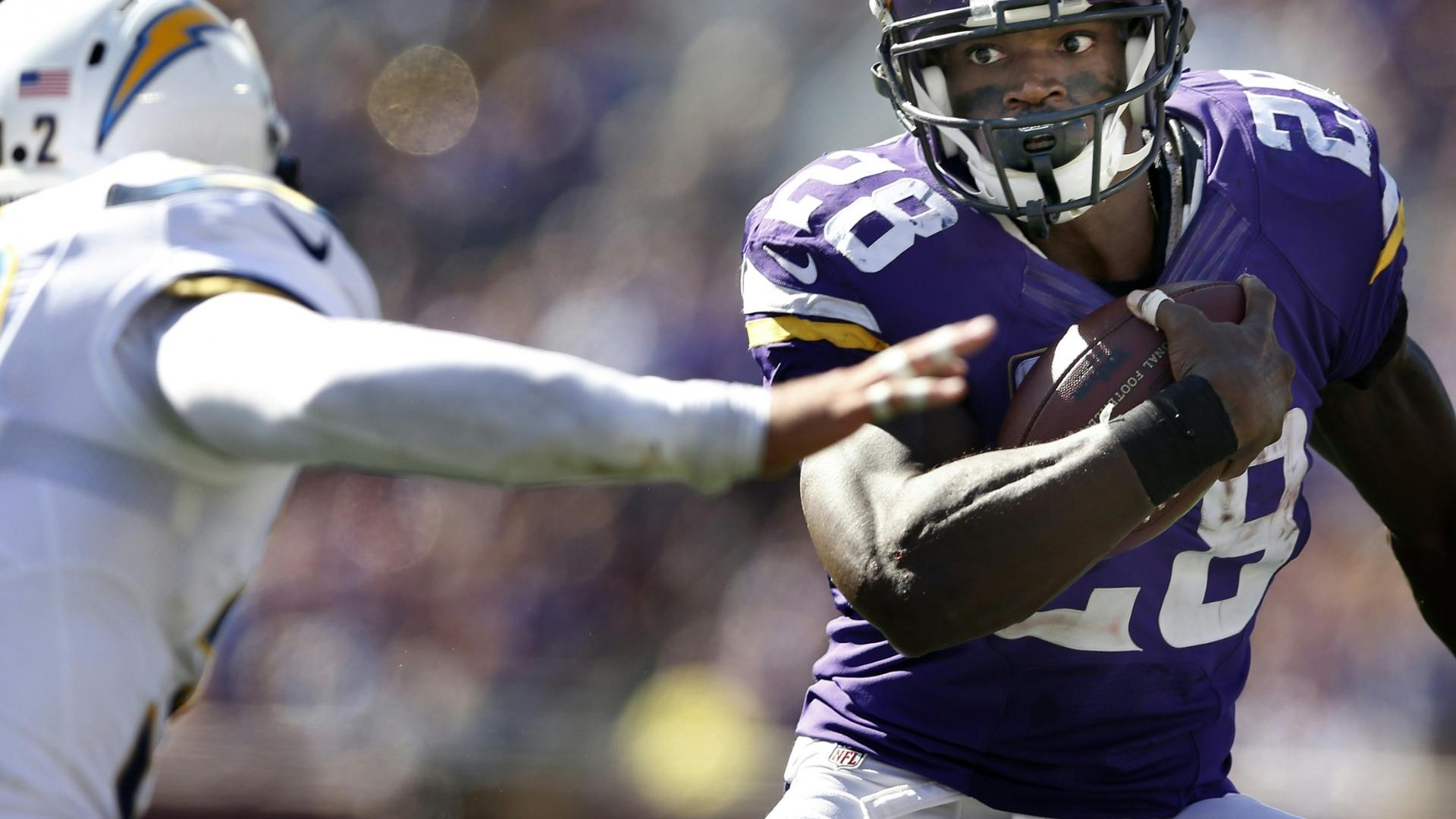 Vikings star running back Adrian Peterson rushed for two touchdowns just hours after his son was born and helped lead his team to a 31-14 victory.